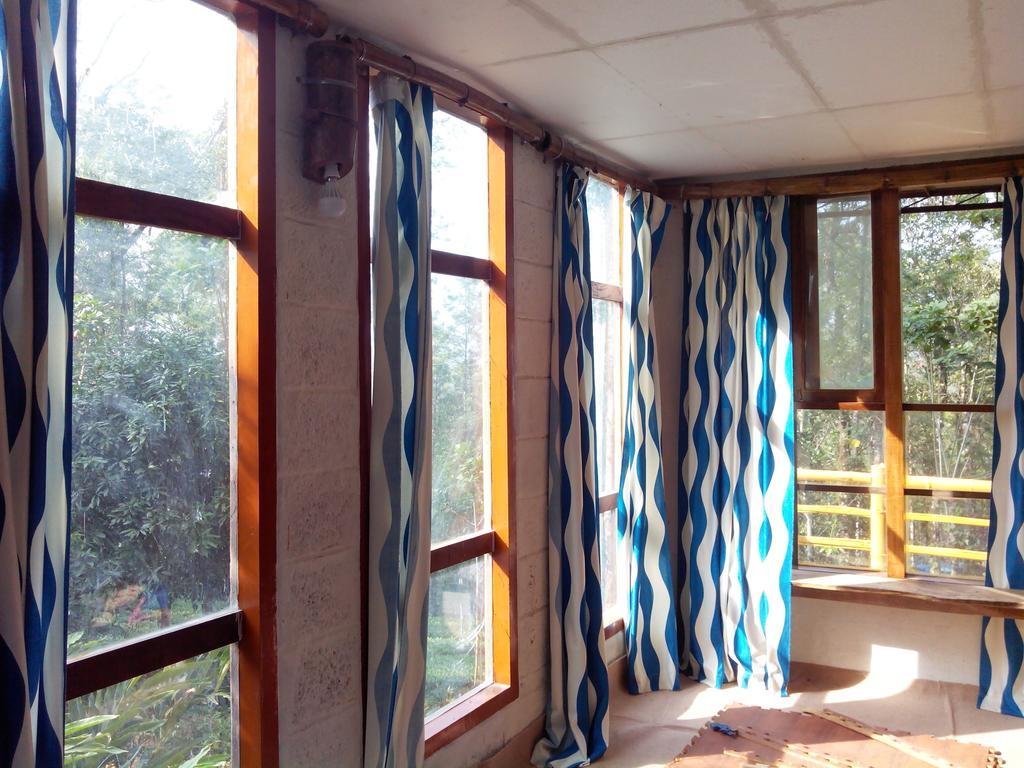 Jungle Jive Tree House Munnar Bed & Breakfast ห้อง รูปภาพ